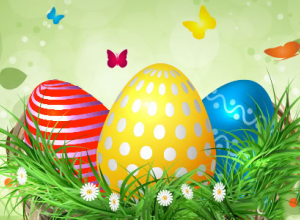 Obrazek przedstawiający kolorowe pisanki na zielonym tle.